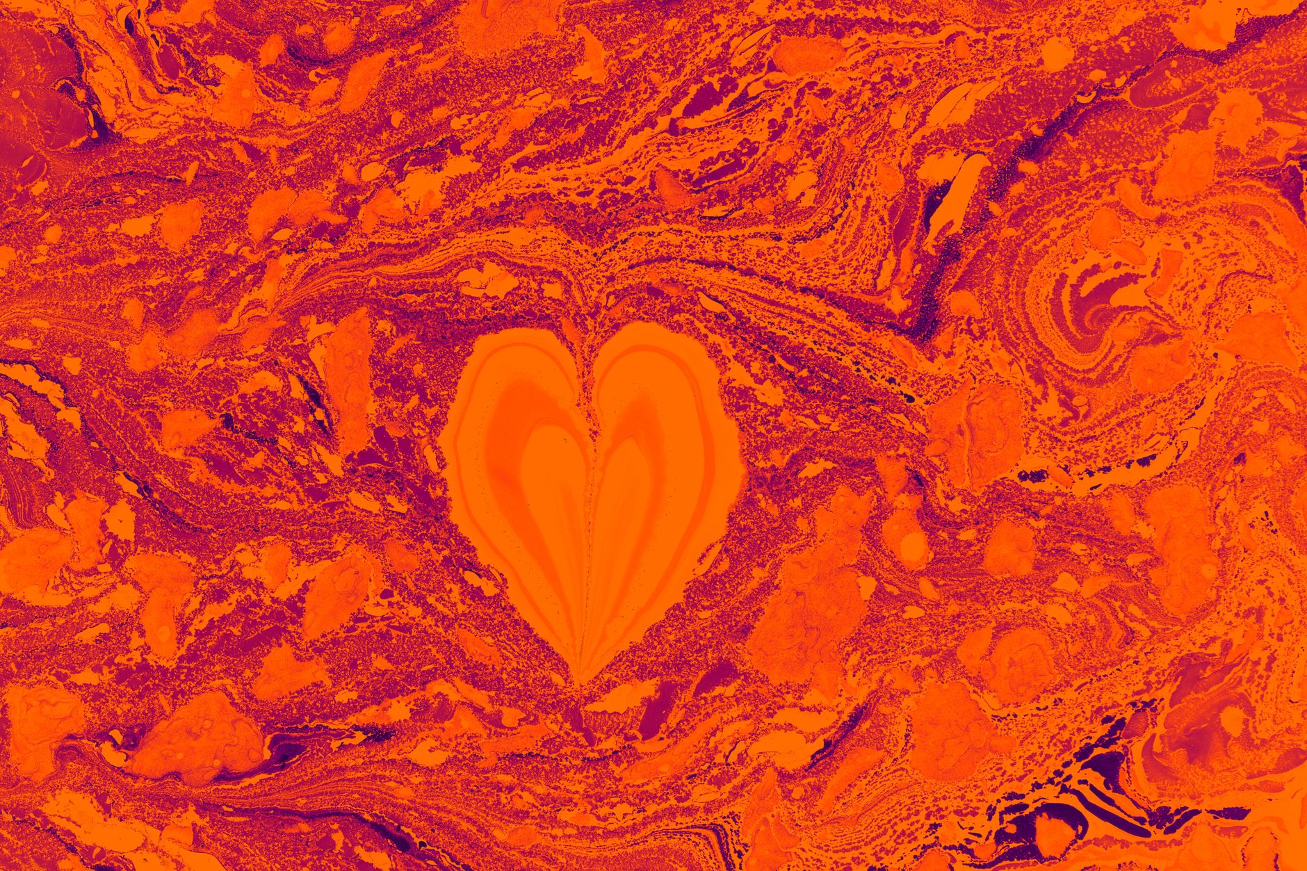 a heart is painted on a red and orange background
