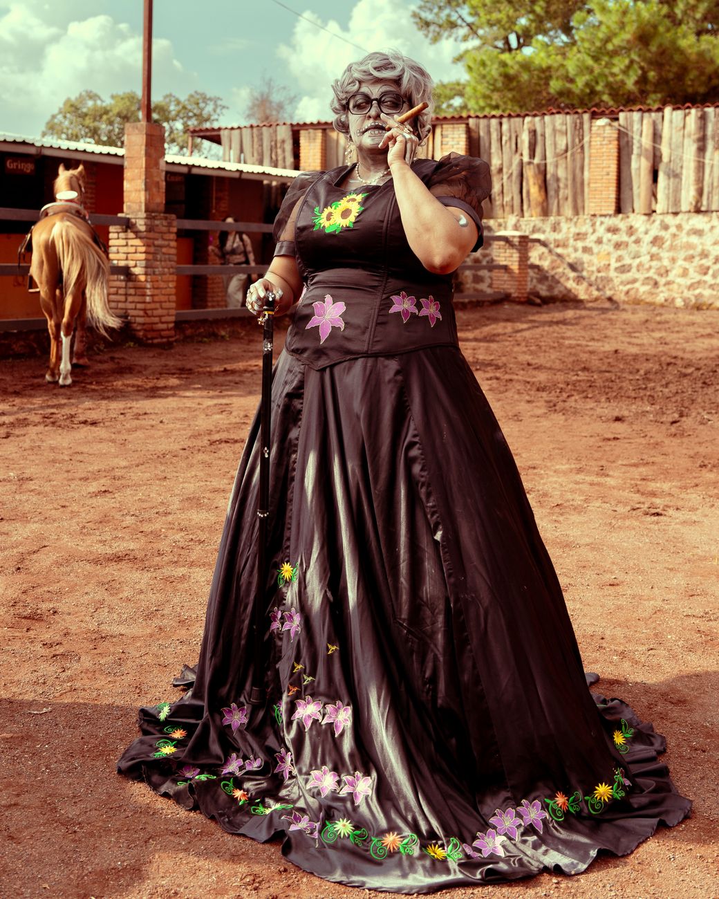 elegant woman in artistic makeup outdoors